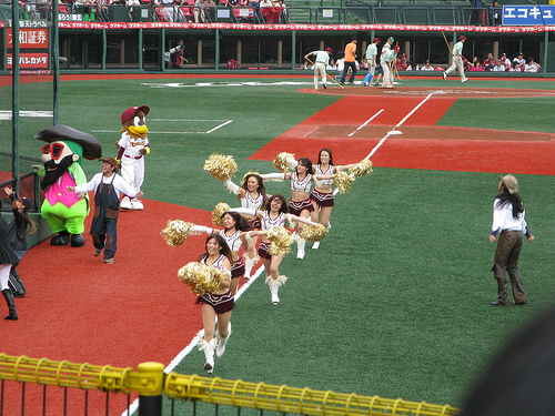 Japanese Baseball - Cheerleaders Run down the Baseline.jpg